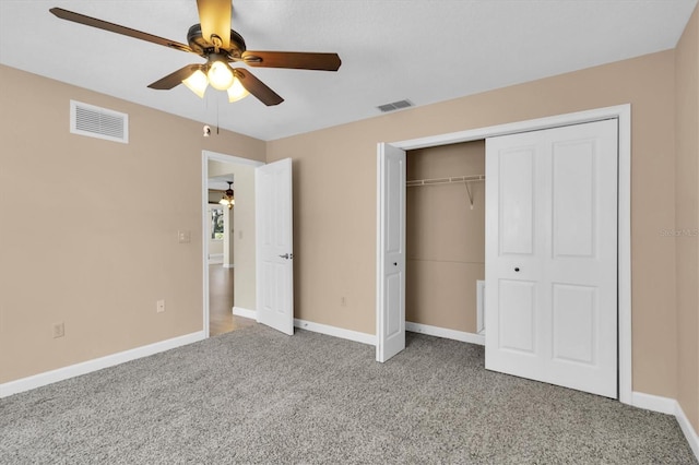 unfurnished bedroom with baseboards, visible vents, and carpet flooring