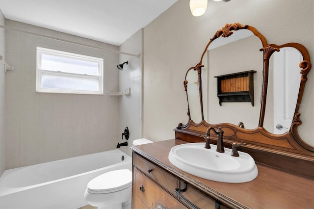 full bathroom with  shower combination, toilet, and vanity