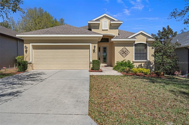 single story home with roof with shingles, stucco siding, an attached garage, a front yard, and driveway