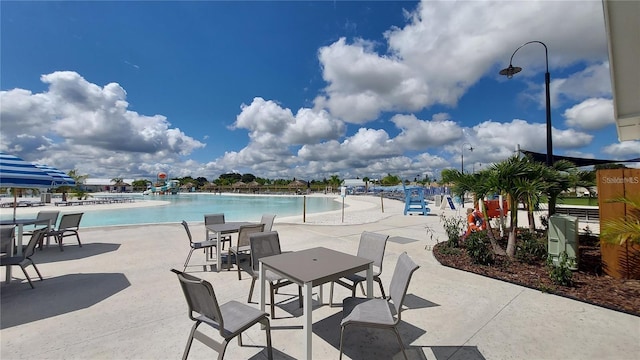 community pool with a patio