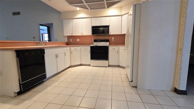 kitchen featuring visible vents, light countertops, black appliances, white cabinetry, and a sink