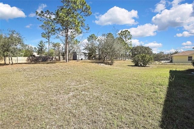 view of yard with fence