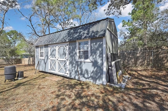 view of shed with a fenced backyard