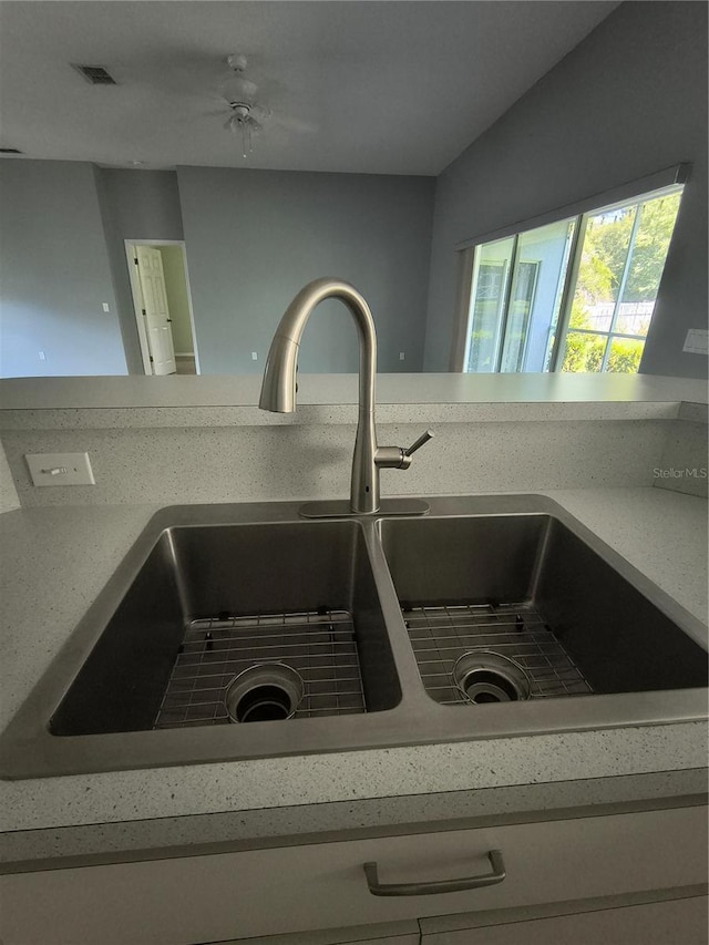 11257 Frigate Bird Ave, Weeki Wachee, FL 34613 - kitchen view of a sink and light countertops