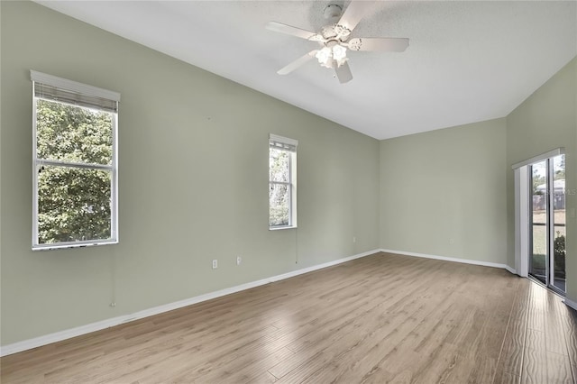 11257 Frigate Bird Ave, Weeki Wachee, FL 34613 - spare room with wood finished floors and a ceiling fan
