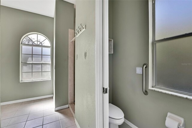 11257 Frigate Bird Ave, Weeki Wachee, FL 34613 - bathroom featuring a stall shower and tile patterned floors
