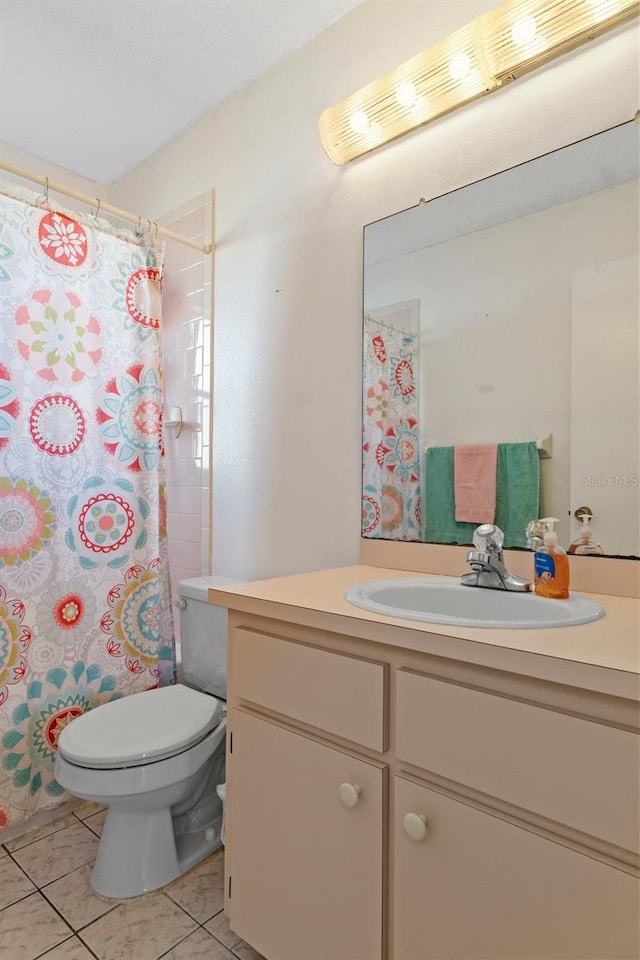 bathroom featuring tile patterned floors, curtained shower, toilet, and vanity