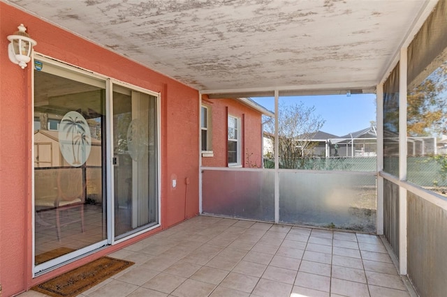 view of unfurnished sunroom