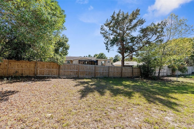 view of yard featuring a fenced backyard