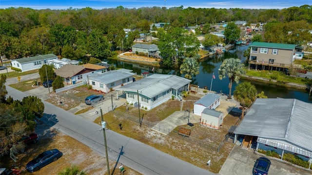 aerial view featuring a water view and a residential view