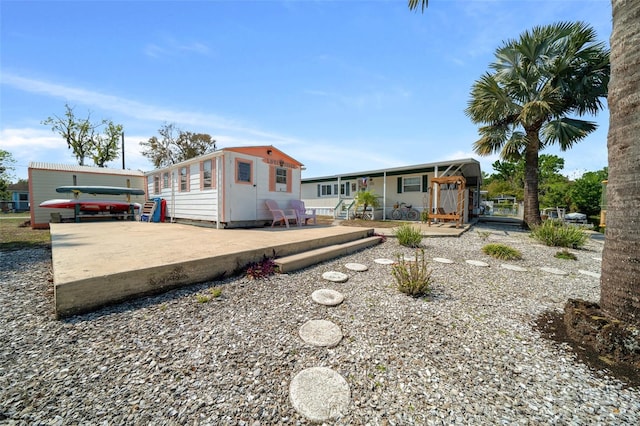 view of front of home with a patio area