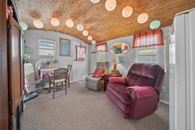 sitting room featuring baseboards, lofted ceiling, carpet, and wooden ceiling