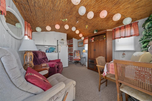 carpeted living room with wood ceiling