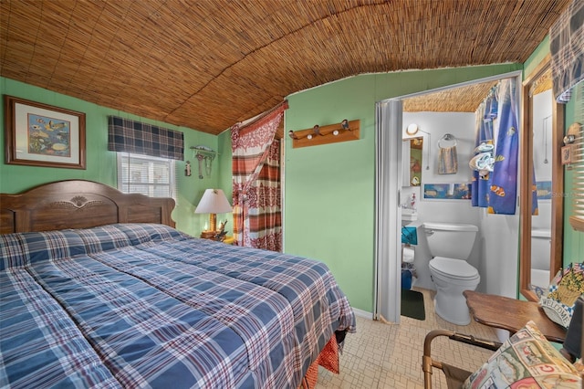 bedroom featuring baseboards and wooden ceiling