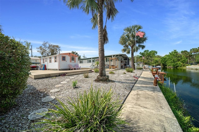 exterior space with a water view