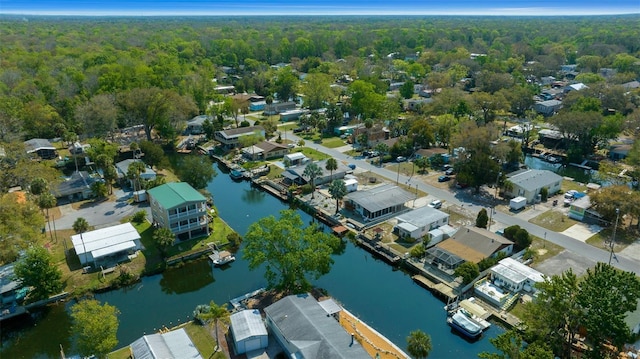 aerial view with a residential view and a view of trees