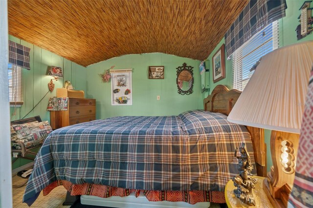 6448 W Richard Dr, Weeki Wachee, FL 34607 - bedroom featuring lofted ceiling and wooden ceiling