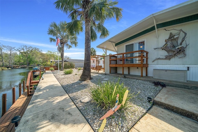 6448 W Richard Dr, Weeki Wachee, FL 34607 - view of yard featuring a dock and a water view
