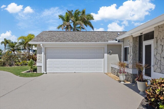 5000 Galleon Ct, New Port Richey, FL 34652 - garage with driveway