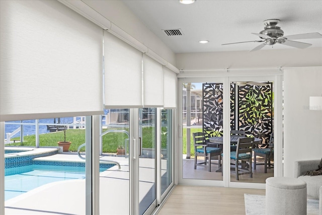 5000 Galleon Ct, New Port Richey, FL 34652 - entryway featuring light wood-style flooring, a ceiling fan, and recessed lighting