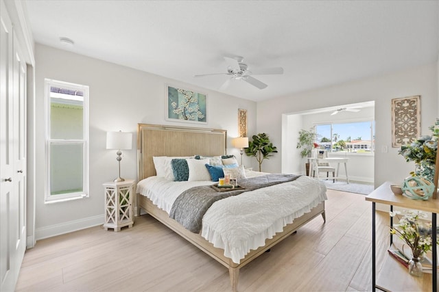 5000 Galleon Ct, New Port Richey, FL 34652 - bedroom featuring light wood finished floors, ceiling fan, and access to outside