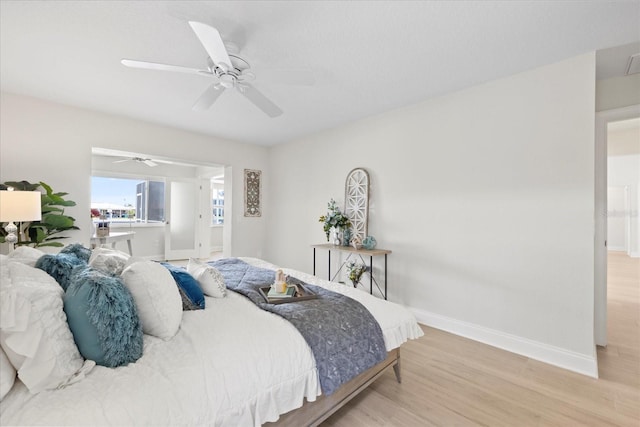 5000 Galleon Ct, New Port Richey, FL 34652 - bedroom with wood finished floors and a ceiling fan