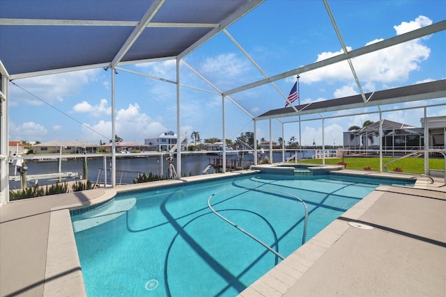5000 Galleon Ct, New Port Richey, FL 34652 - view of pool with a lanai, a patio, a pool with connected hot tub, and a water view