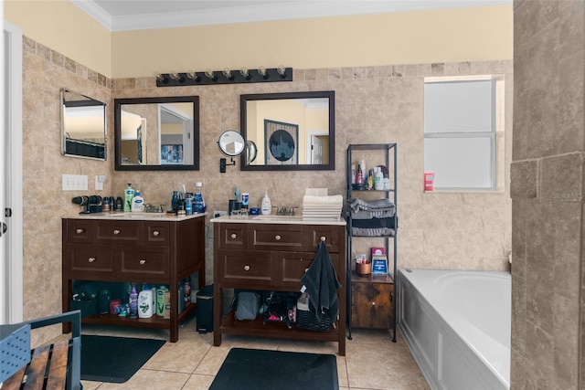 full bathroom with ornamental molding, tile walls, tile patterned flooring, a bath, and vanity