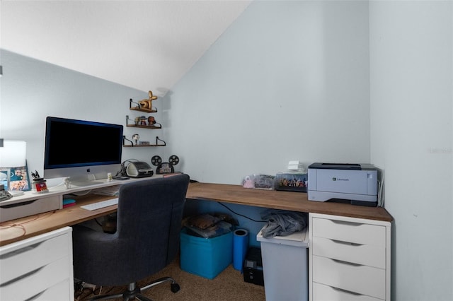 office space with vaulted ceiling and carpet floors