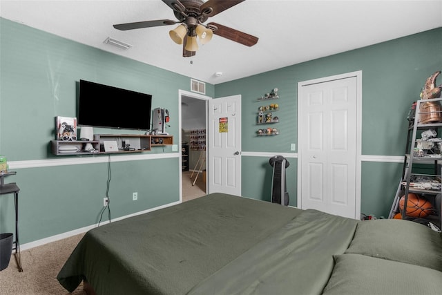 bedroom featuring visible vents, carpet flooring, and ceiling fan