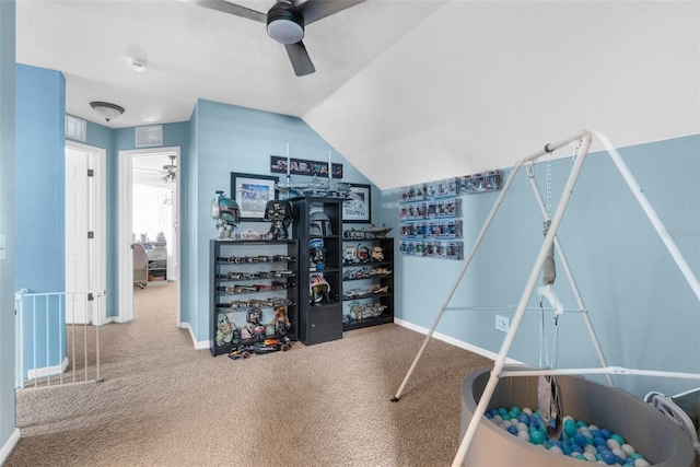 interior space with lofted ceiling and ceiling fan