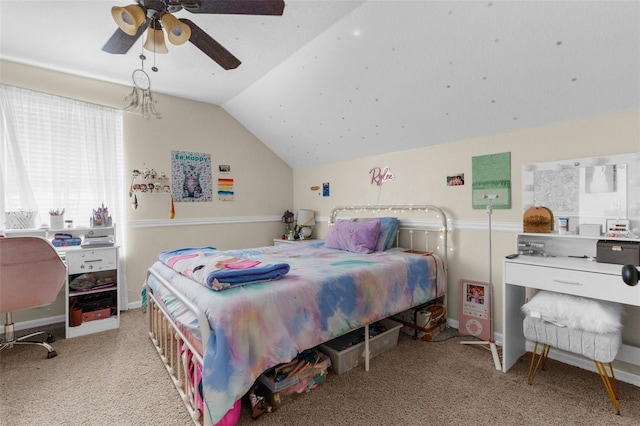 carpeted bedroom with ceiling fan and lofted ceiling