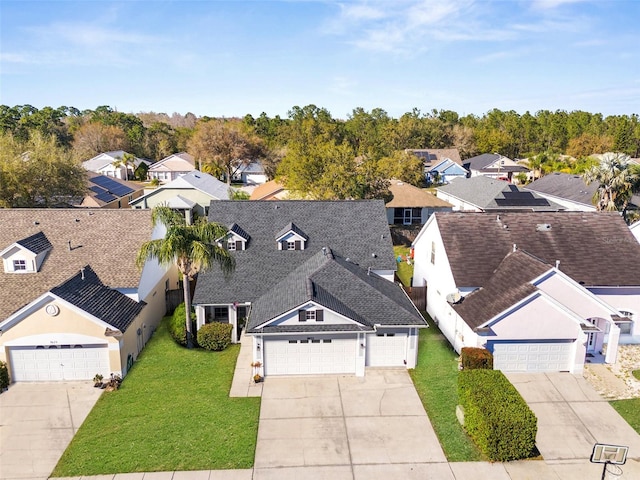 drone / aerial view with a residential view