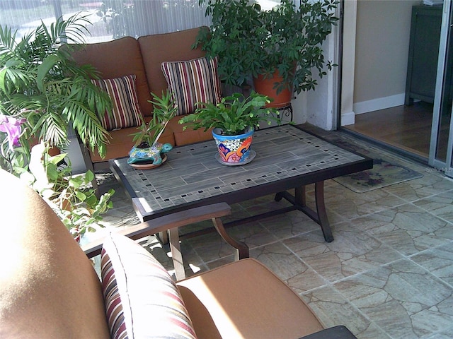 balcony featuring a patio area and outdoor lounge area