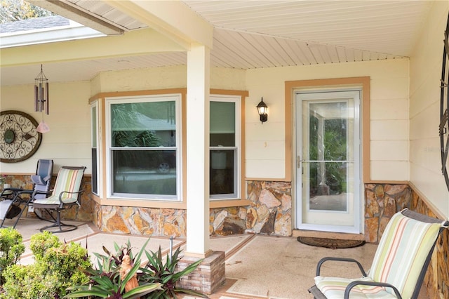 view of exterior entry with stone siding