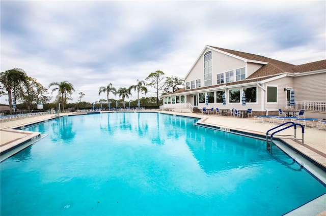 community pool with a patio