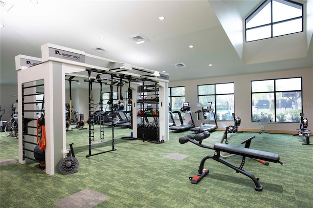 exercise room with baseboards, carpet flooring, visible vents, and recessed lighting