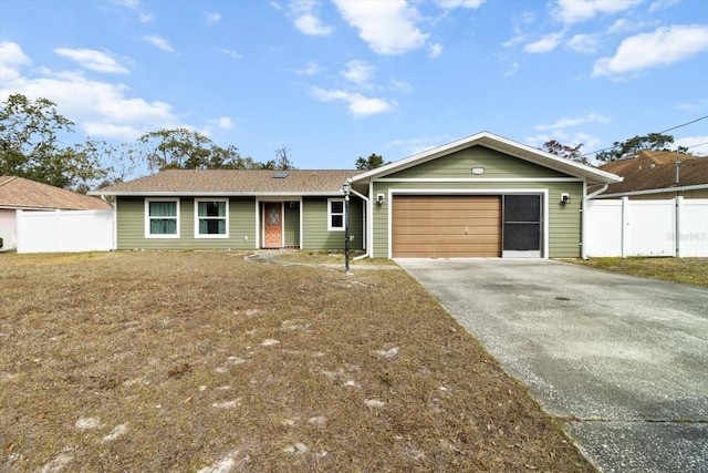 single story home featuring driveway, an attached garage, and fence