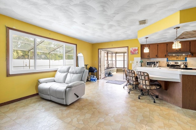 5441 Alderwood St, Spring Hill, FL 34606 - office area featuring visible vents, a textured ceiling, and baseboards