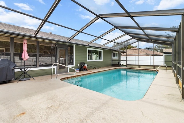 5441 Alderwood St, Spring Hill, FL 34606 - view of swimming pool featuring a fenced in pool, a lanai, a grill, and a patio