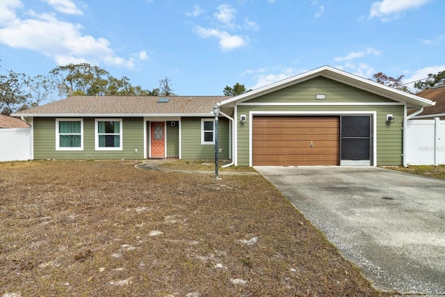 5441 Alderwood St, Spring Hill, FL 34606 - ranch-style home with aphalt driveway, an attached garage, and fence