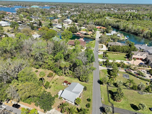 bird's eye view with a residential view and a water view