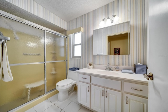 8420 Winding Wood Dr, Port Richey, FL 34668 - full bathroom featuring a textured ceiling, a shower stall, toilet, and wallpapered walls