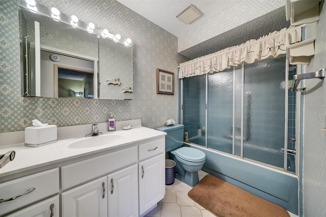 8420 Winding Wood Dr, Port Richey, FL 34668 - full bath featuring bath / shower combo with glass door, a textured ceiling, vanity, tile patterned flooring, and wallpapered walls
