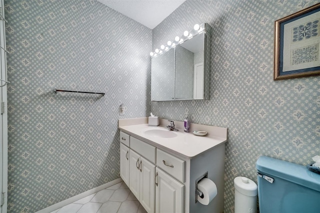 8420 Winding Wood Dr, Port Richey, FL 34668 - bathroom with wallpapered walls, toilet, and tile patterned floors