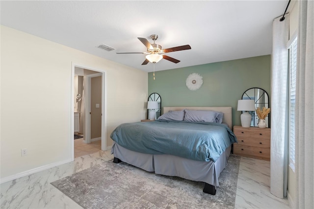 bedroom with visible vents, baseboards, marble finish floor, and ceiling fan