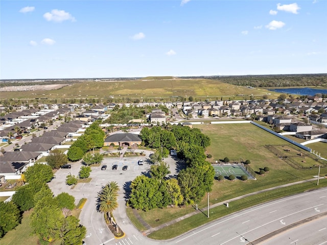 aerial view with a residential view and a water view