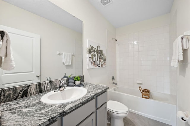 full bathroom featuring shower / bath combination, visible vents, toilet, tile patterned flooring, and vanity