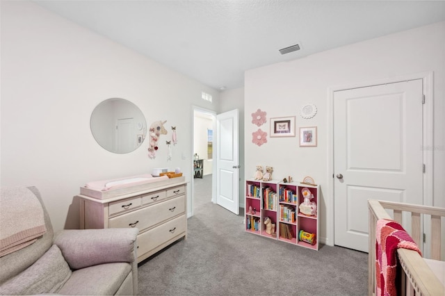 interior space featuring visible vents and carpet flooring