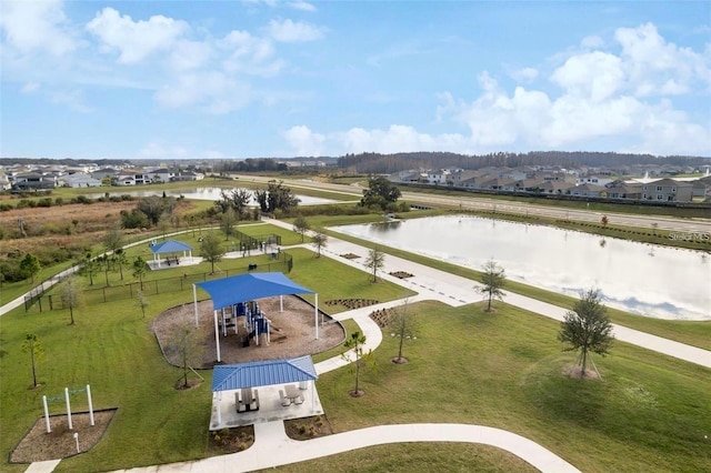 bird's eye view with a residential view and a water view